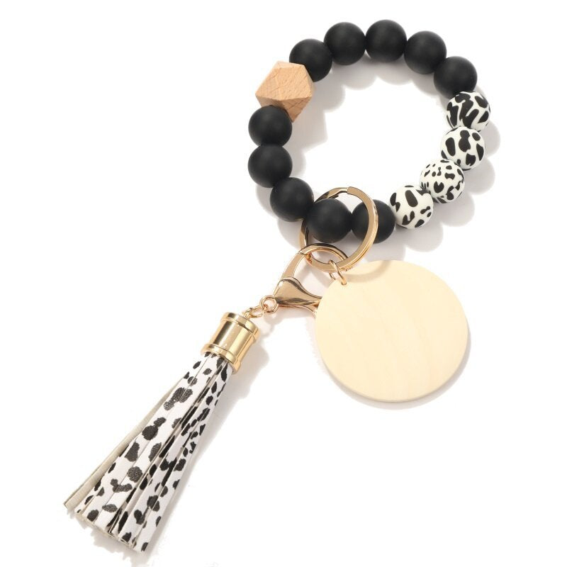 Llavero de muñeca con cuentas de silicona con flecos de marca de madera en blanco al por mayor